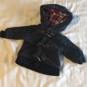 Gray sweatshirt with red plaid lining